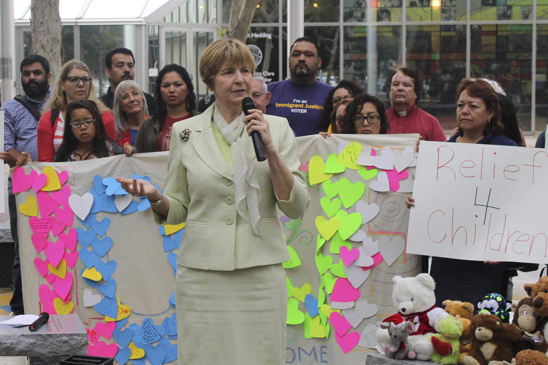 Sparky Halan speaking at a rally supporting undocumented unaccompanied minors.