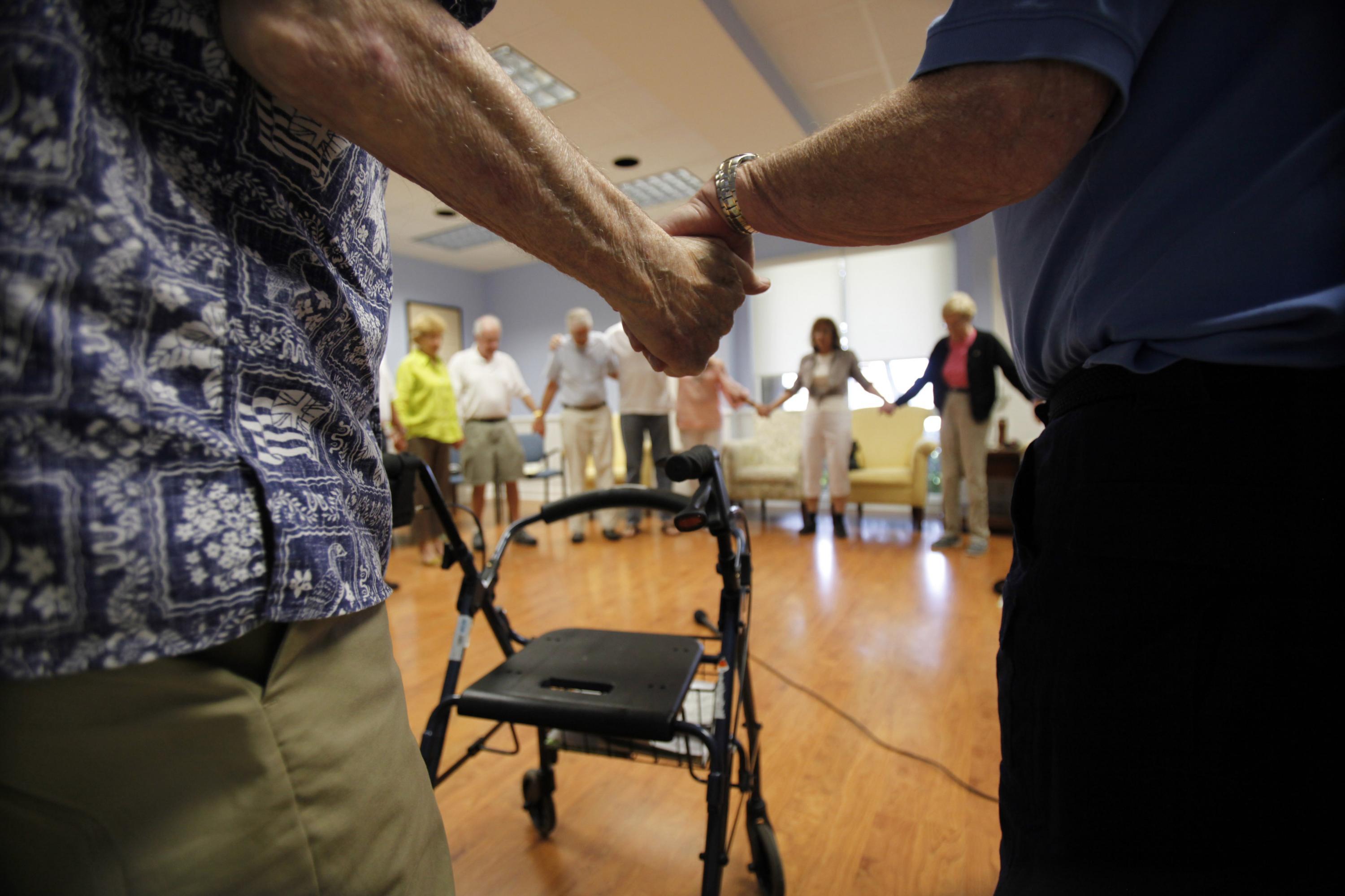 FIGHTING ADDICTION - The number of older adults seeking treatment for substance abuse is growing fast. Here, seniors participate in a support group in Florida.