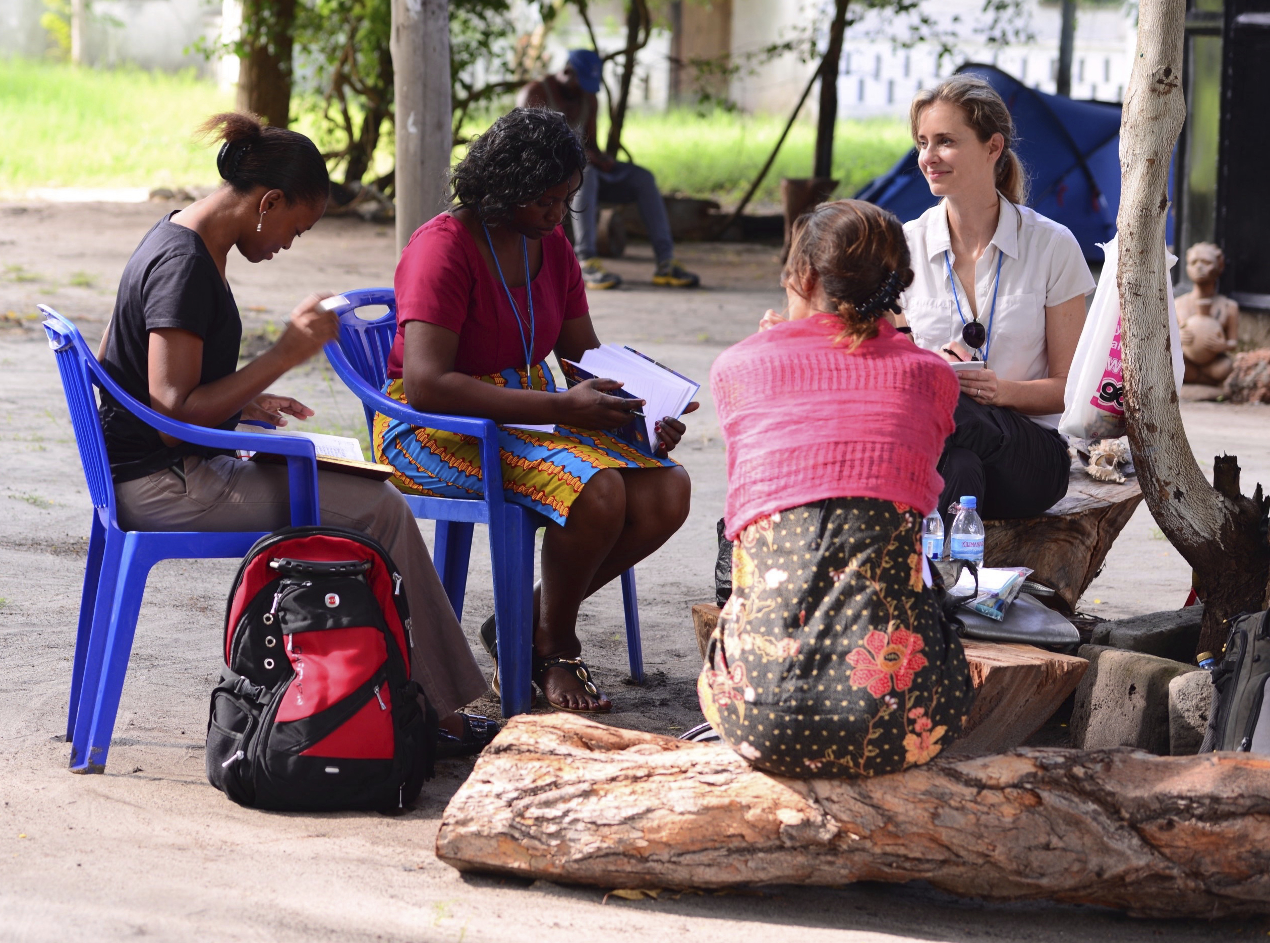 Design thinker and founding member of Maverick Collective Pam Scott talks to a woman in Bagamoyo, Tanzania, about the causes and consequences of unintended teen pregnancy.