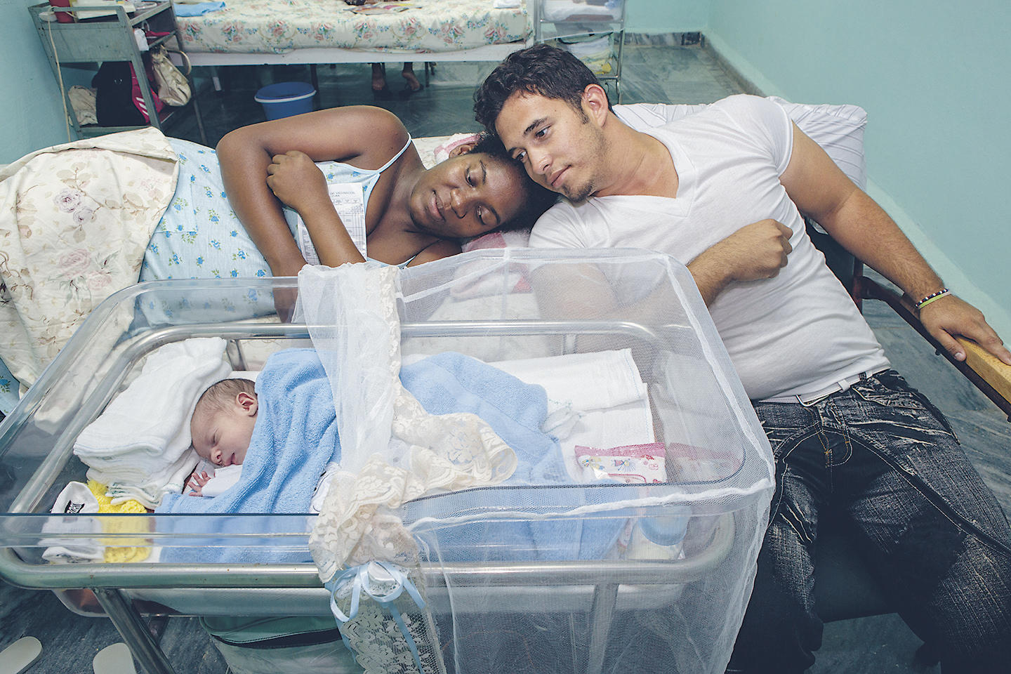 Grants worth $6.8 million to the Research and Education Facilities program on the Isle of Youth in Cuba helped establish medical-care facilities focused on kidney and heart disease as well as other ailments and paid for rebuilding one of its hospitals after two devastating hurricanes in 2008. Here, the parents of 8-day-old Alain Daniel keep a close watch on him in a maternity ward.