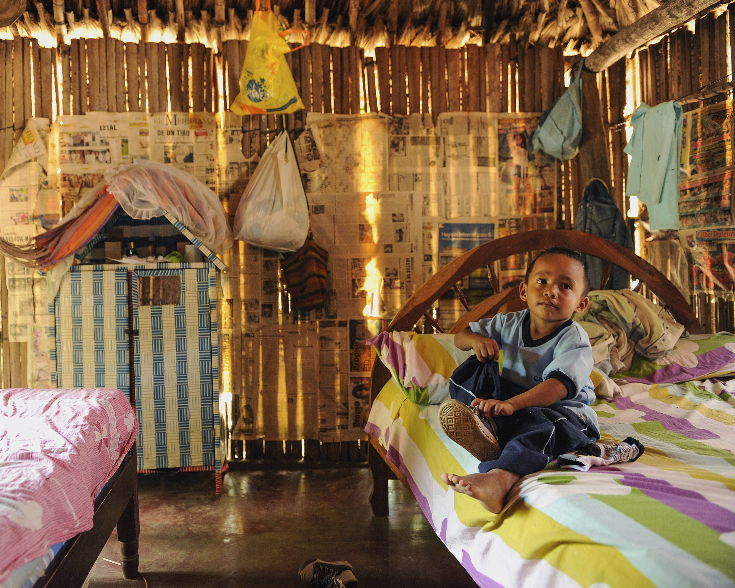 Jesus David Flores Martinez, 4, whose mother died soon after his birth, lives with his aunt in a household of 12 people in Colombia.