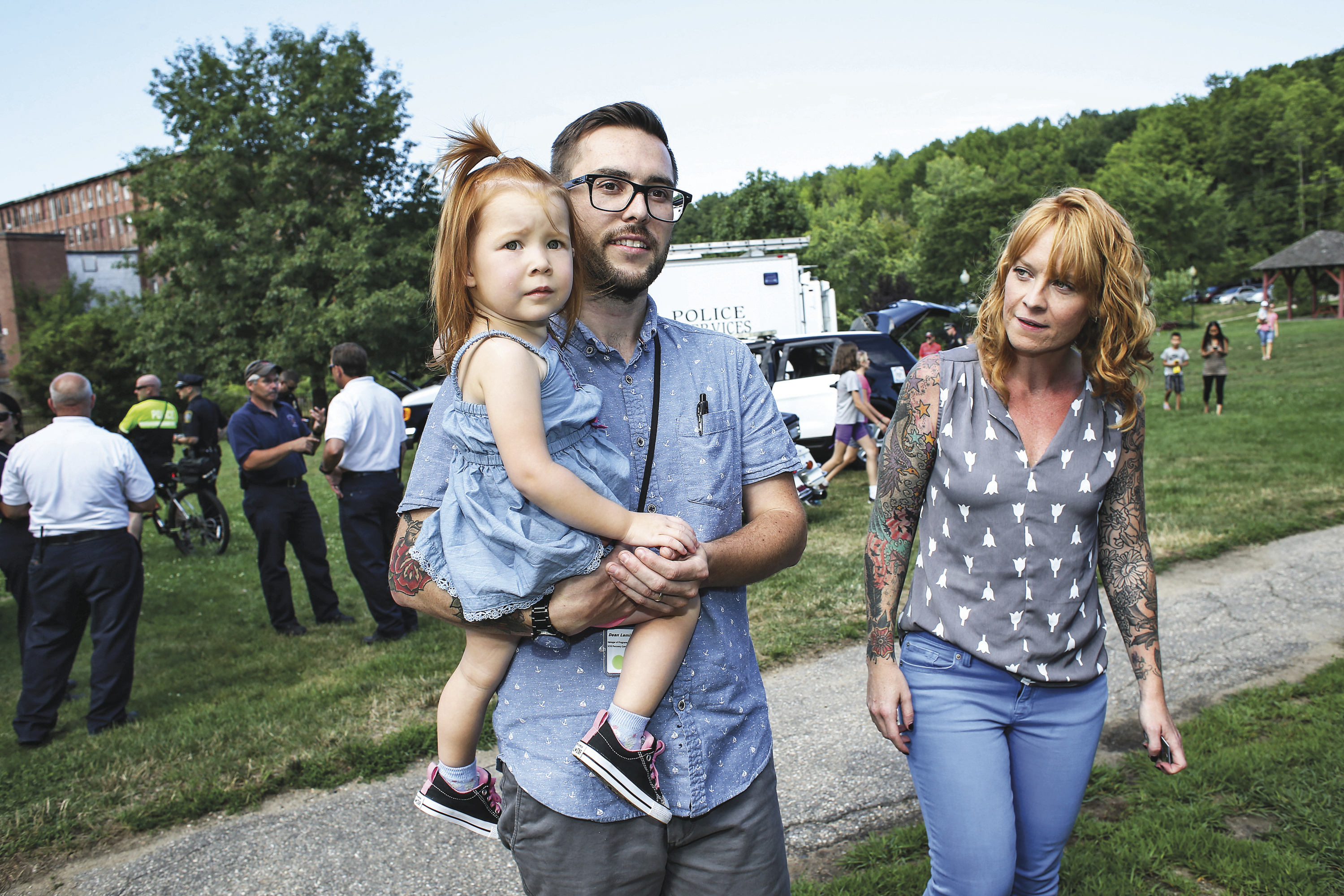 Dean Lemire, who is in long-term recovery, enjoys time with his family in Dover, N.H., during a recent National Night Out, an annual nationwide event that promotes strong neighborhood ties and improved community-police relations.