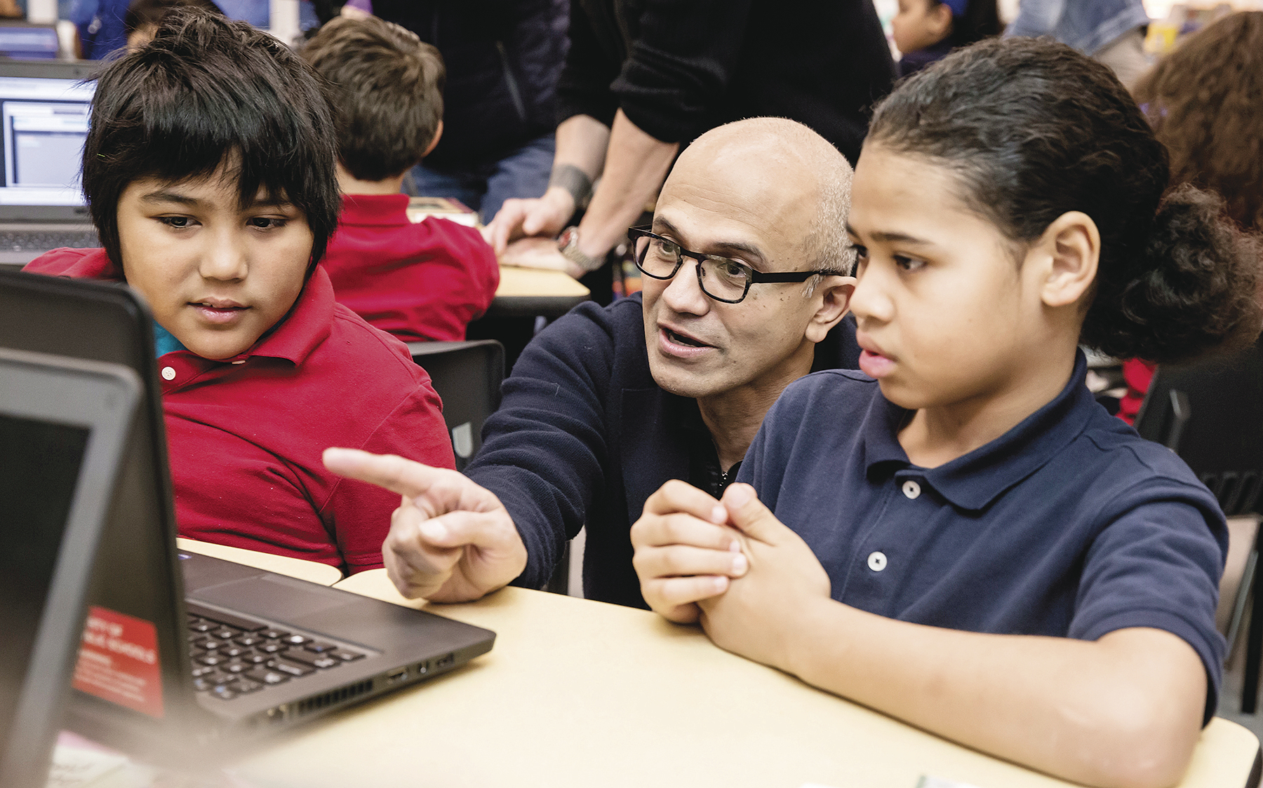 TECH START-UP: Microsoft CEO Satya Nadella takes part in the Hour of Code, which introduces students to programming and computer science. 
