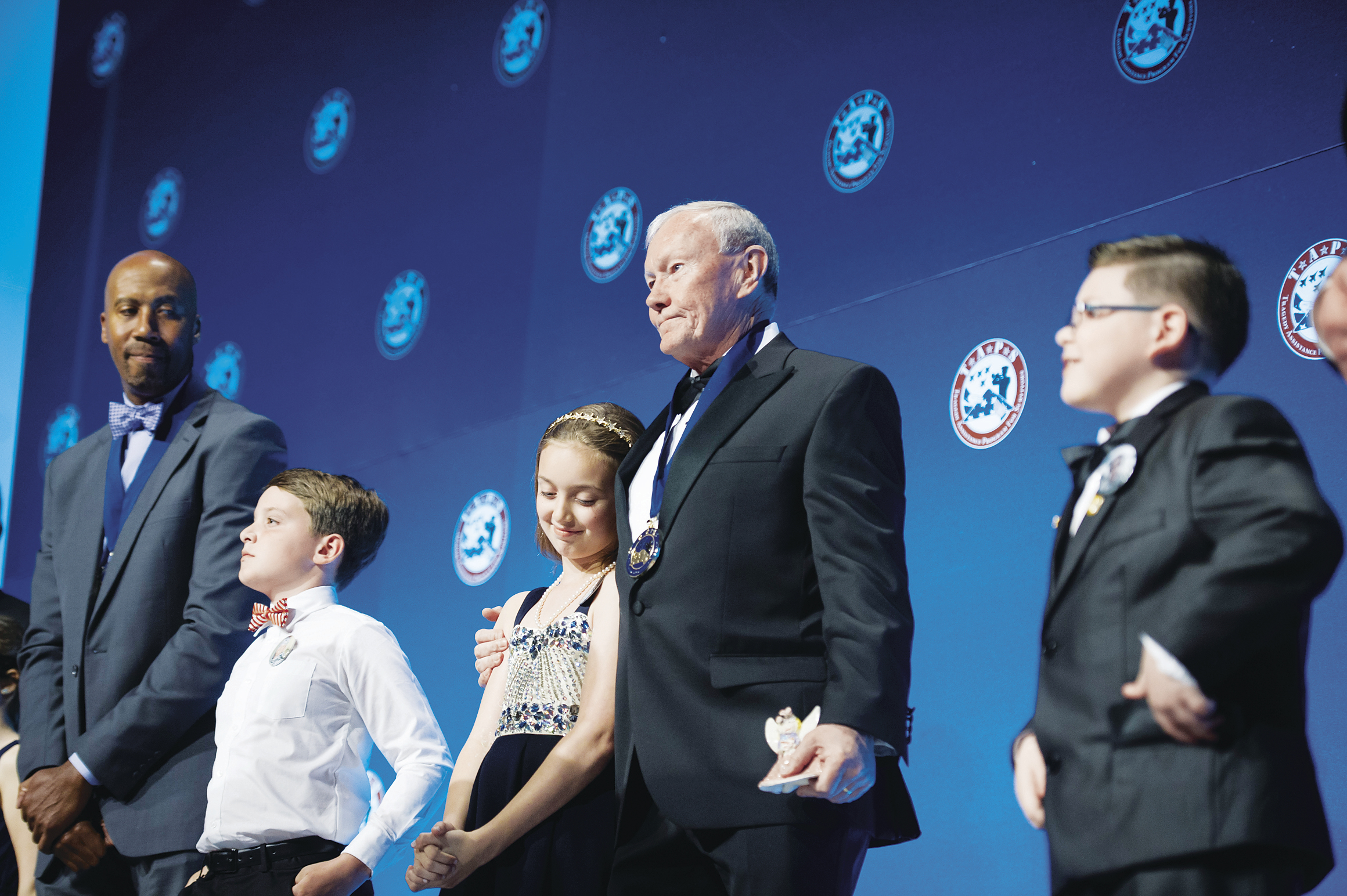 Retired Gen. Martin Dempsey met Lizzie Yaggy at a TAPS event in 2011 when the girl, then 4, asked him if her deceased father was an angel. Yaggy has introduced him at every TAPS event since, including this 2017 gala.