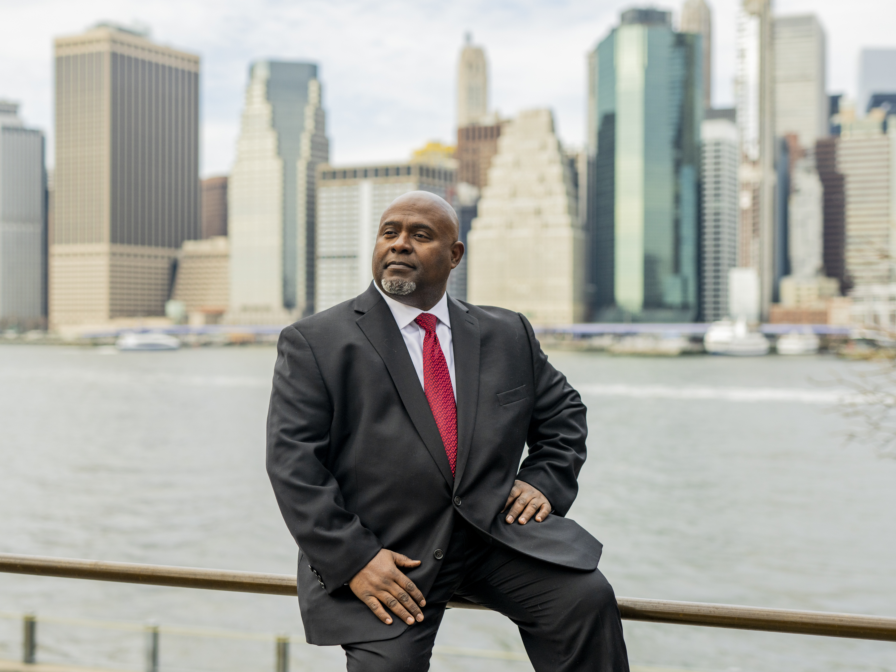 Joe Scantlebury, President & CEO of Living Cities, poses for a portrait at Brooklyn Bridge Park in Brooklyn, New York. .