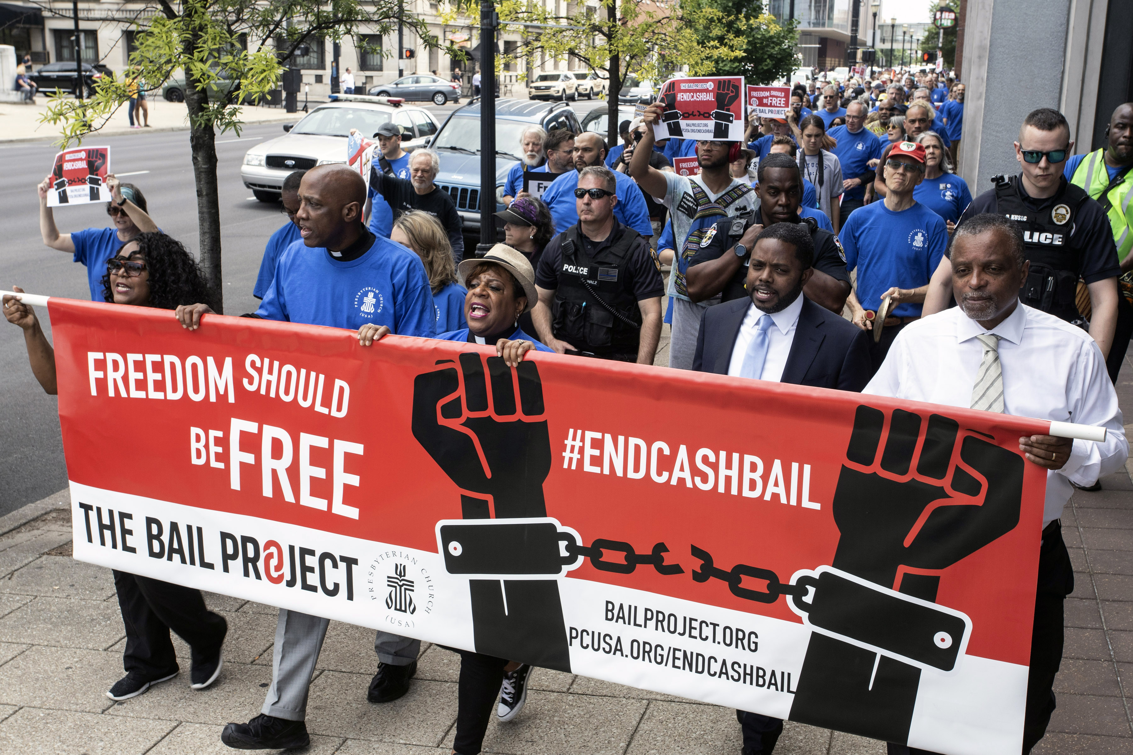 A large group marched through downtown Louisville on June 12, 2019 as part of a rally organized by the Presbyterian Church and The Bail Project.