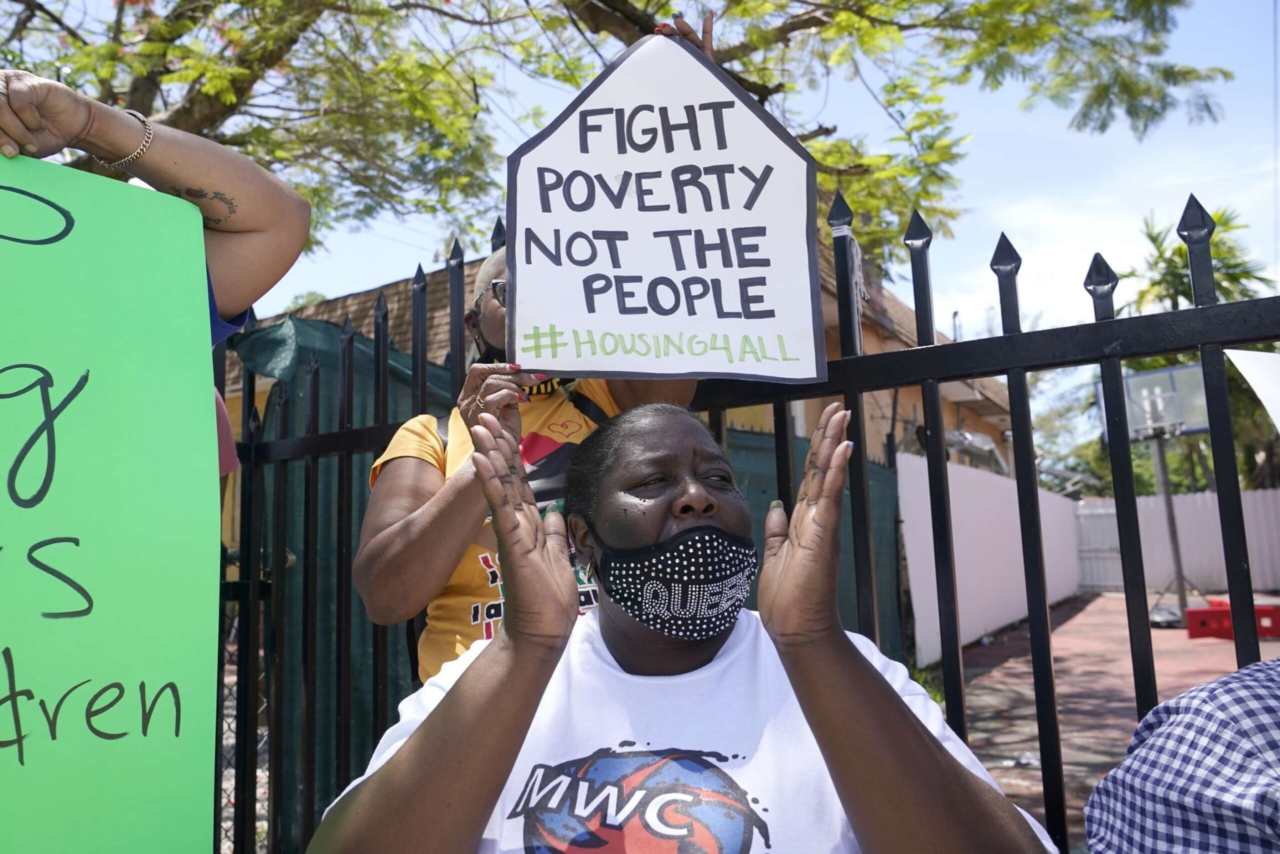 Devetria Stratford chants slogans at a rally held in support of tenant Elena Riech, Tuesday, June 8, 2021, in Miami. Reich, who’s husband died unexpectedly last year, is a single mother with three children who is at risk of eviction, as she has been unable to pay rent since January. Local organizations such as the Miami Workers Center and the Community Justice Project are involved in her case.