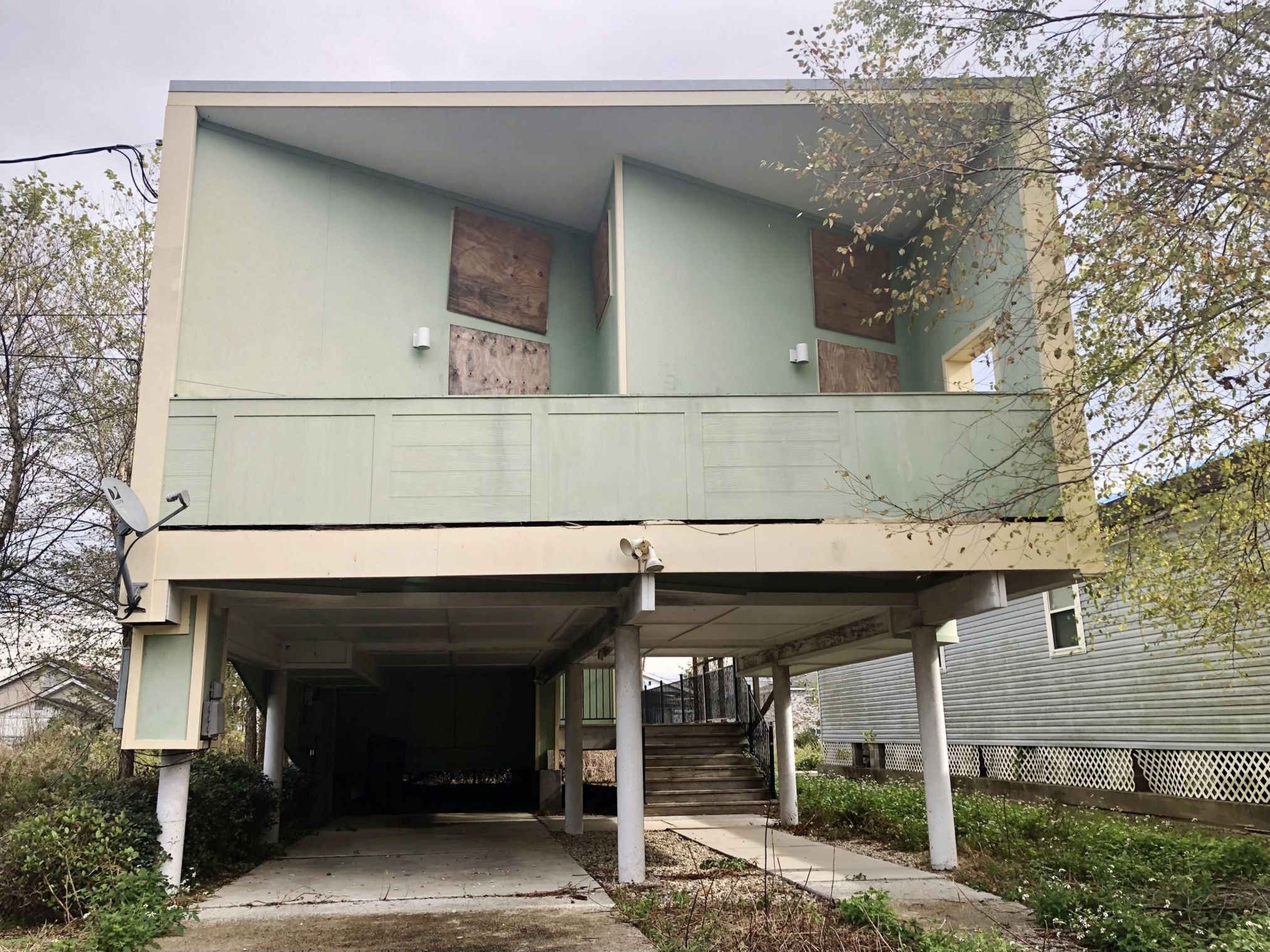 This Make It Right home was vacant and boarded up in 2021.