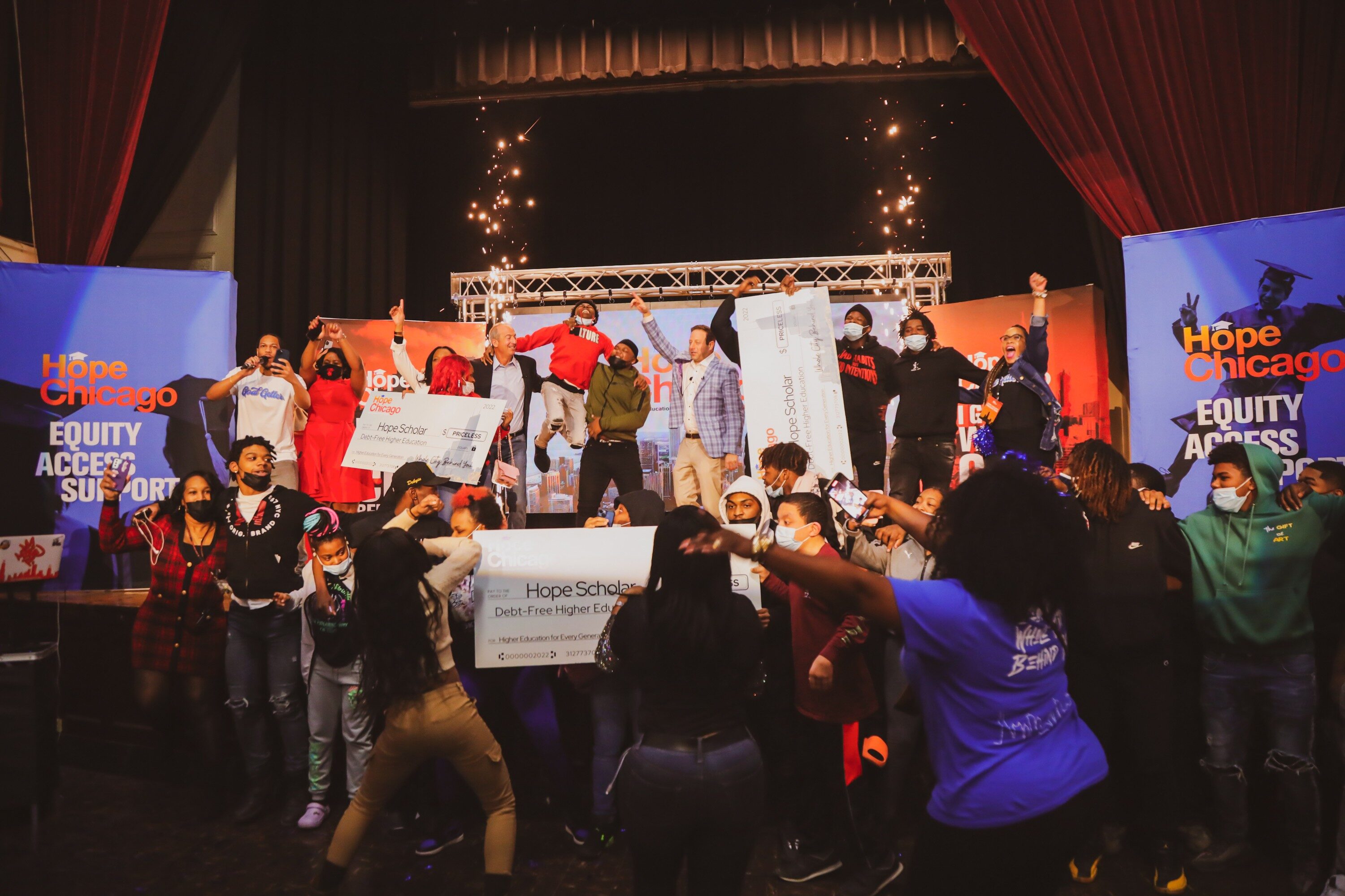 On Feb. 22, 2022, the entire student body (197 students total) at Al Raby High School received a surprise visit from Hope Chicago and was told that they and their parents are receiving full, debt-free college scholarships to partner colleges and universities. At center in plaid jacket is Pete Kadens.