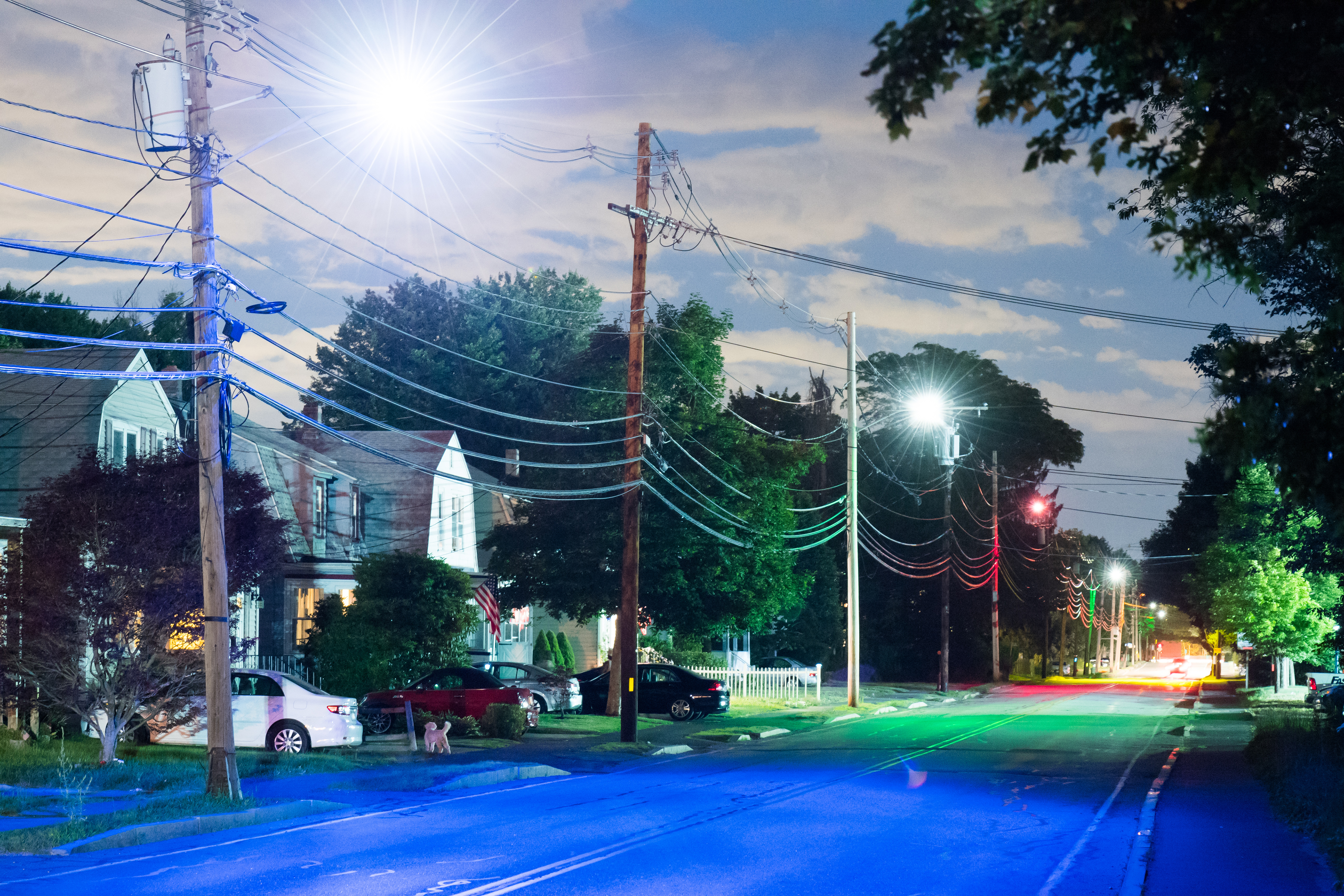 Ashland-Nyanza Project, June 2016 — This is a spatial intervention where the scientific color gradients of the below-grade contamination are transposed to the existing street lighting grid. Given that the Nyanza site had 100 different source chemicals, what remains is a unique cocktail of sludge below grade. The colors signify areas of concentration- Red being the most concentrated and slowly decreasing into Orange, Yellow, Green, Blue and the Purple roughly mapping the extents of the monitoring area. The result is a polychromatic environment that shifts color in order to create a new cognitive map of place.