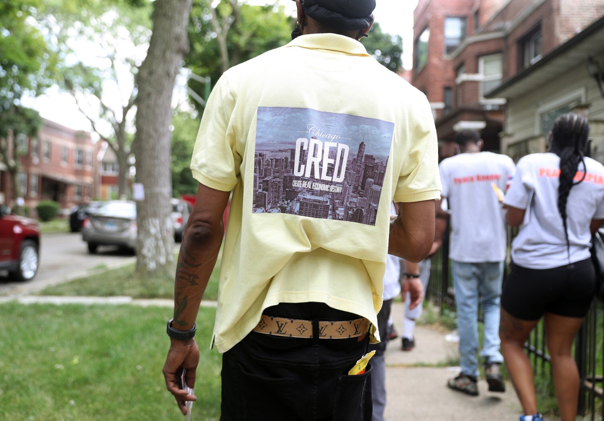 Chicago CRED outreach supervisor Terrance Henderson walks with coworkers during an outreach walk in the Roseland neighborhood Thursday, July 9, 2020, in Chicago. (John J. Kim, Chicago Tribune, Tribune News Service, Getty Images)