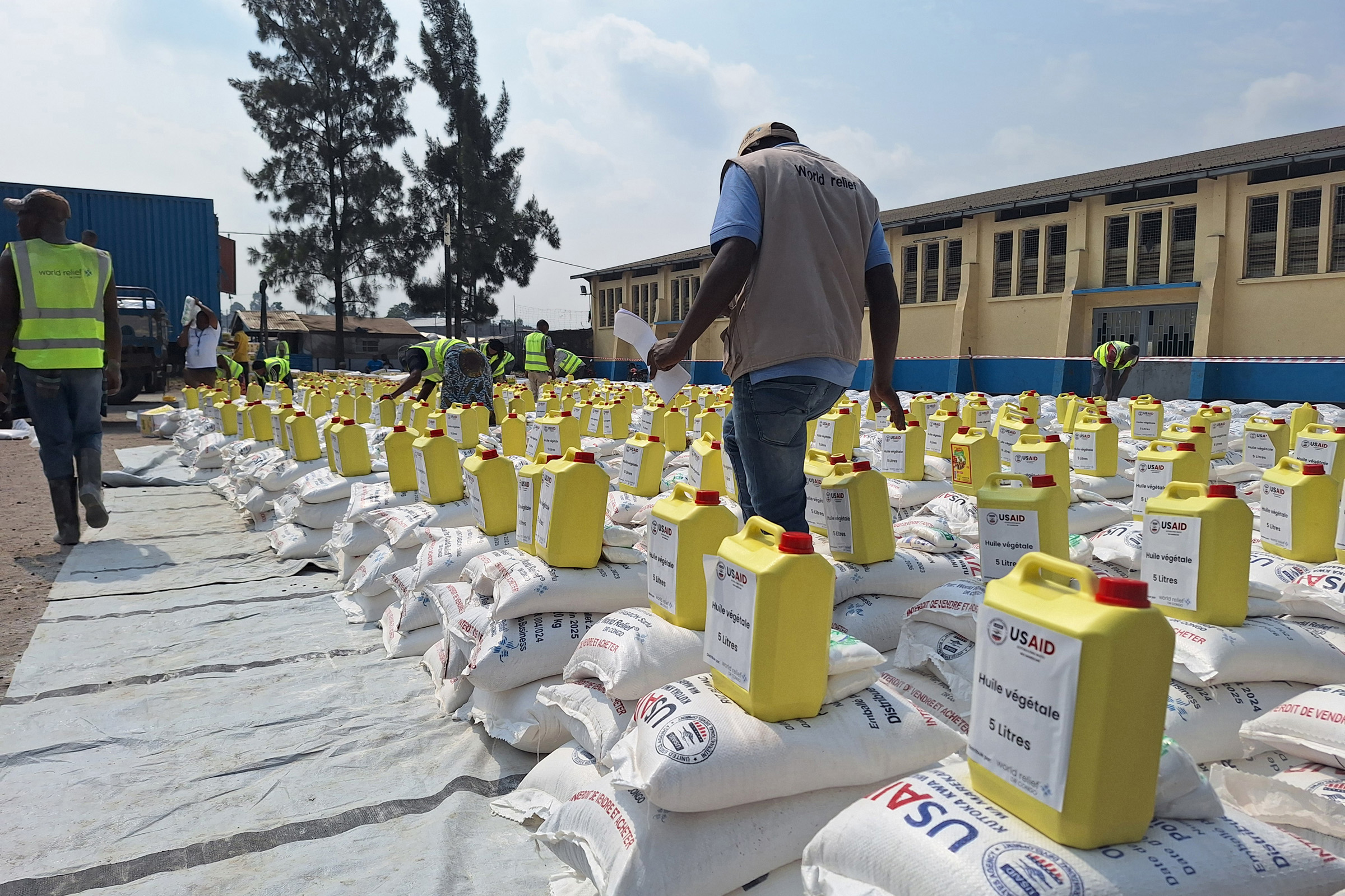Workers with World Relief set up a food distribution at the Don Bosco camp for internally-displaced Congolese, in the Democratic Republic of Congo in 2024. World Relief has been responding to humanitarian crises in DR Congo since 2001.