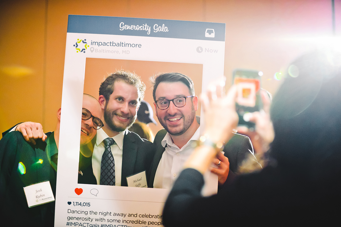 Making it easy for participants to share social-media updates during an event can help your nonprofit reach more supporters. Here, Impact Baltimore, the young adult division of the Associated: Jewish Community Federation of Baltimore, brings the virtual world into the real world in a playful way.