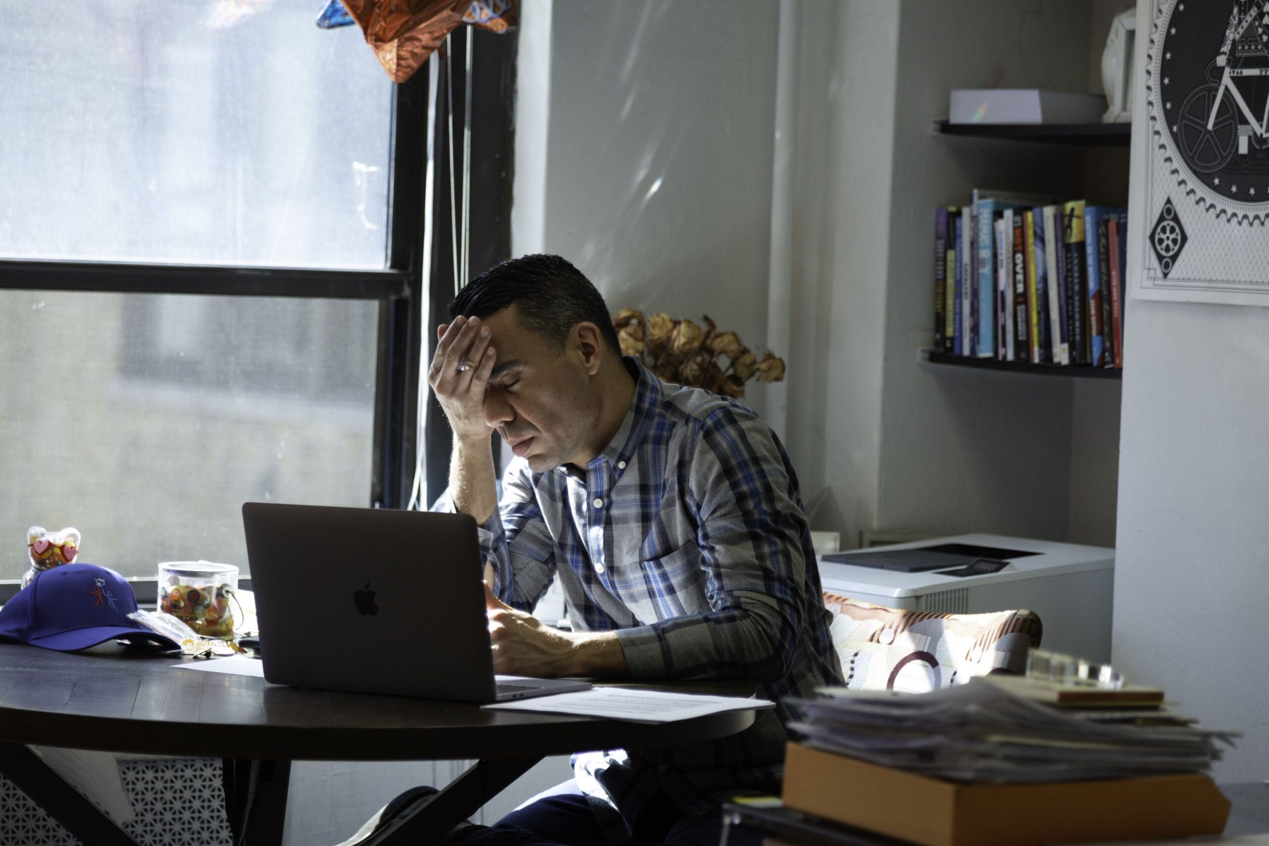 Alex Roque, President and Executive Director of the Ali Forney Center in New York City, pauses during a zoom call at his office discussing rapid emergency housing for LGBTQ youth on Thursday, February 25, 2021.