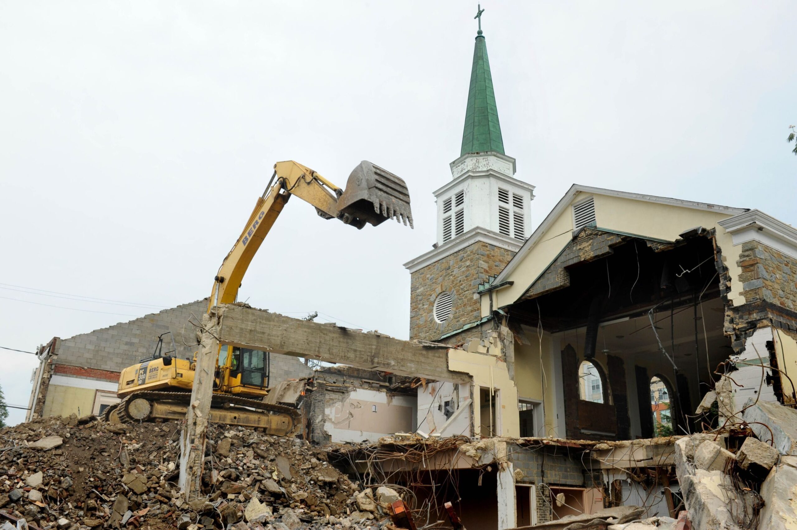 APAH Arlington Partnership for Affordable Housing has the groundbreaking for Gilliam Place, a new mixed affordable housing project. Shown is the demolition of  Arlington Presbyterian Church at 3507 Columbia Pike Arlington, VA 22204.
