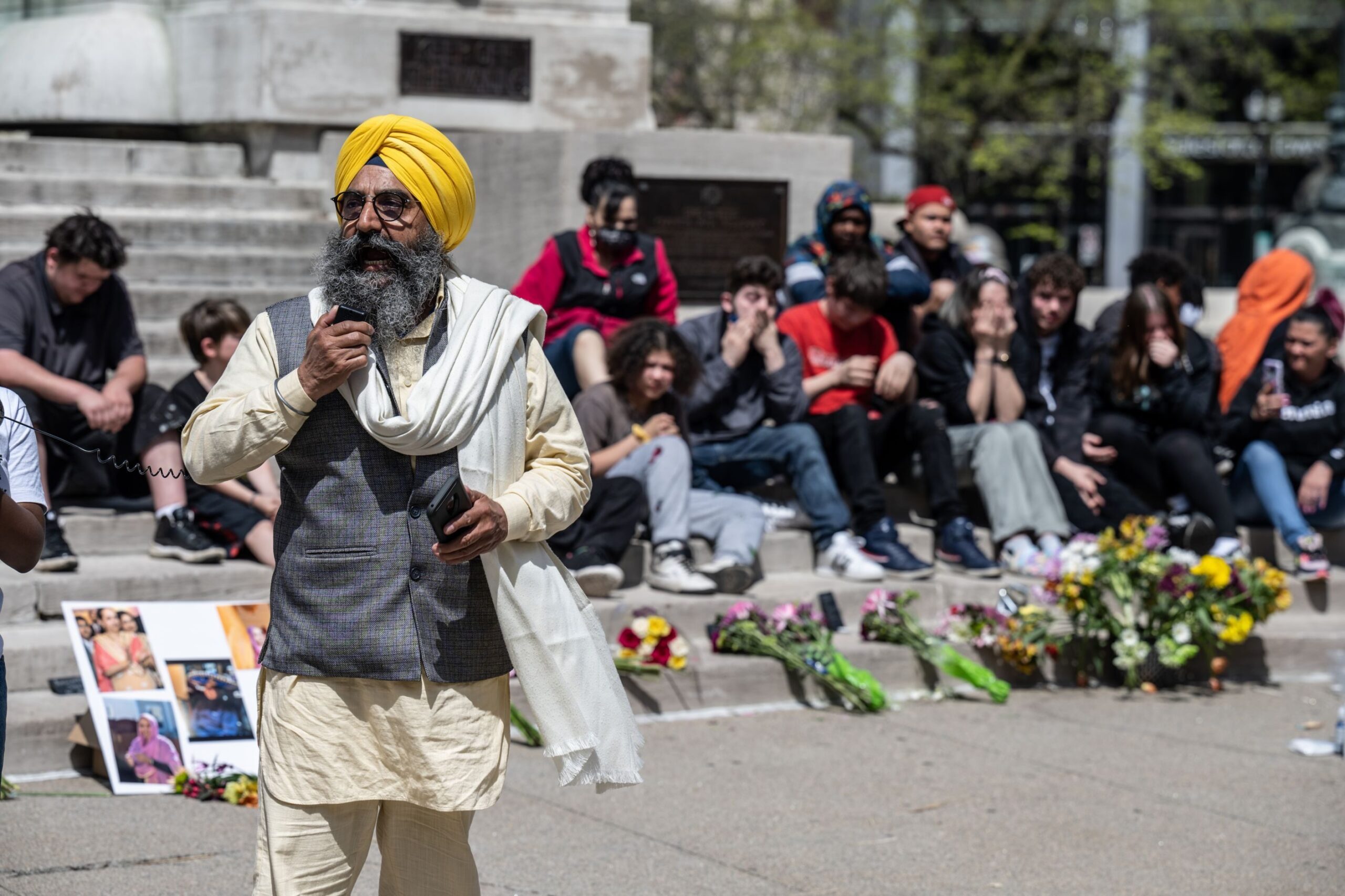 Maninder Singh Walia, a leader of the Sikh coalition of the Sikh Satsang of Indianapolis, speaks during a vigil at Monument Circle for the victims of the mass shooting at the FedEx facility on April 18, 2021 in Indianapolis, Indiana. Four of the eight victims of the April 15 shooting were Sikh. According to reports, the shooter, Brandon Hole, purchased the two assault weapons he used in the shooting even after having a shotgun confiscated by the FBI in a previous investigation.