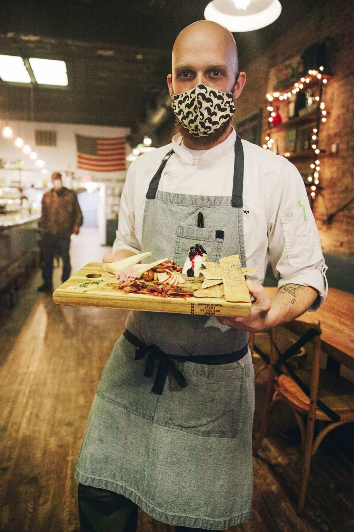 A server at the Wrigley Taproom & Eatery, a restaurant in Corbin, Ky., that received emergency grant and loan assistance from the Foundation for Appalachian Kentucky.